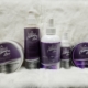 Purple Activated Shampoo & Conditioner Bundle on a white fur rug.