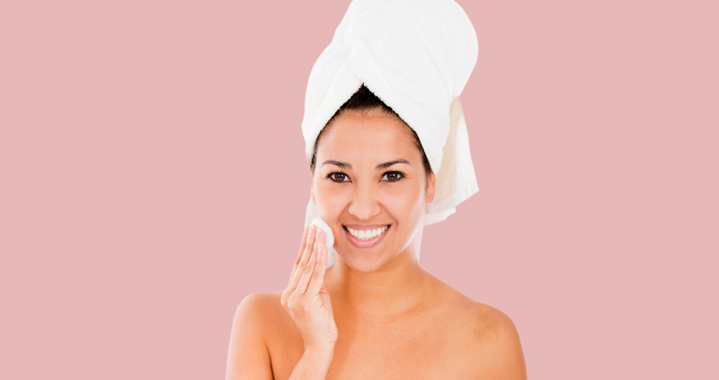 A woman smiling after her spa treatment