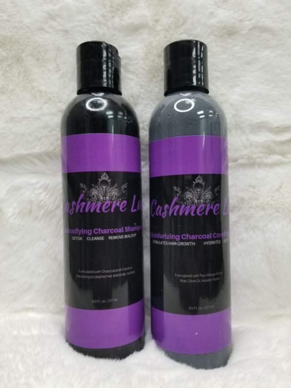 Two bottles of hair care products on a white background.